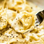 Close-up of creamy Chicken Tortelloni Alfredo.